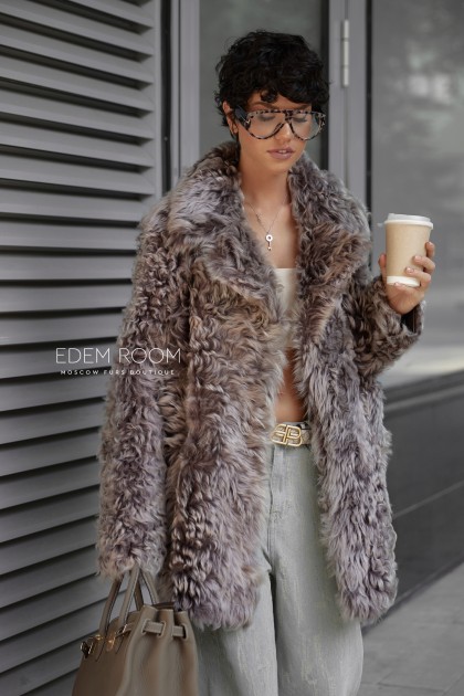 полушубок из меха тиградо